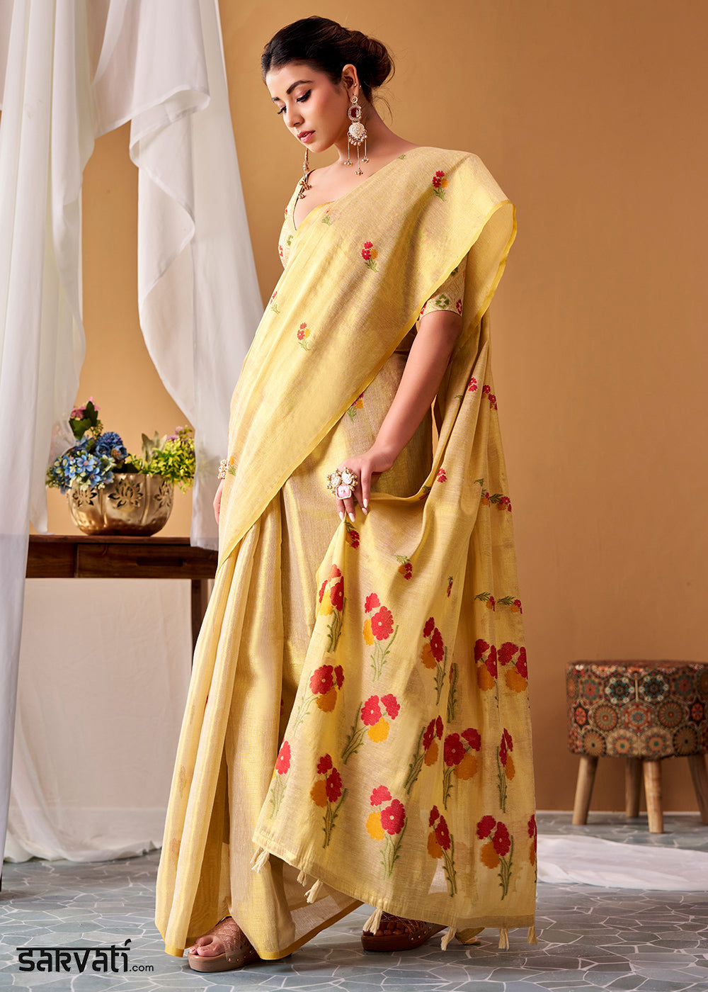 Cream White Tissue Silk Saree with Intricate Allover Floral Motifs
