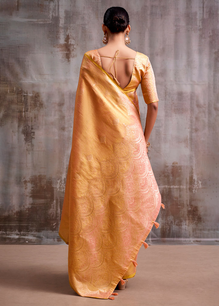 Tones Of Orange Tissue Silk Saree with Intricate Zari Artistry