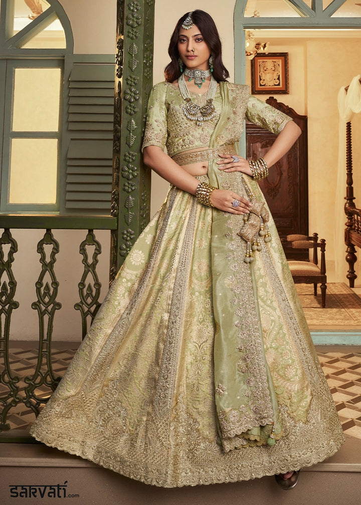 Tea Green Zari Woven Banarasi Silk Lehenga Choli with Traditional Motifs