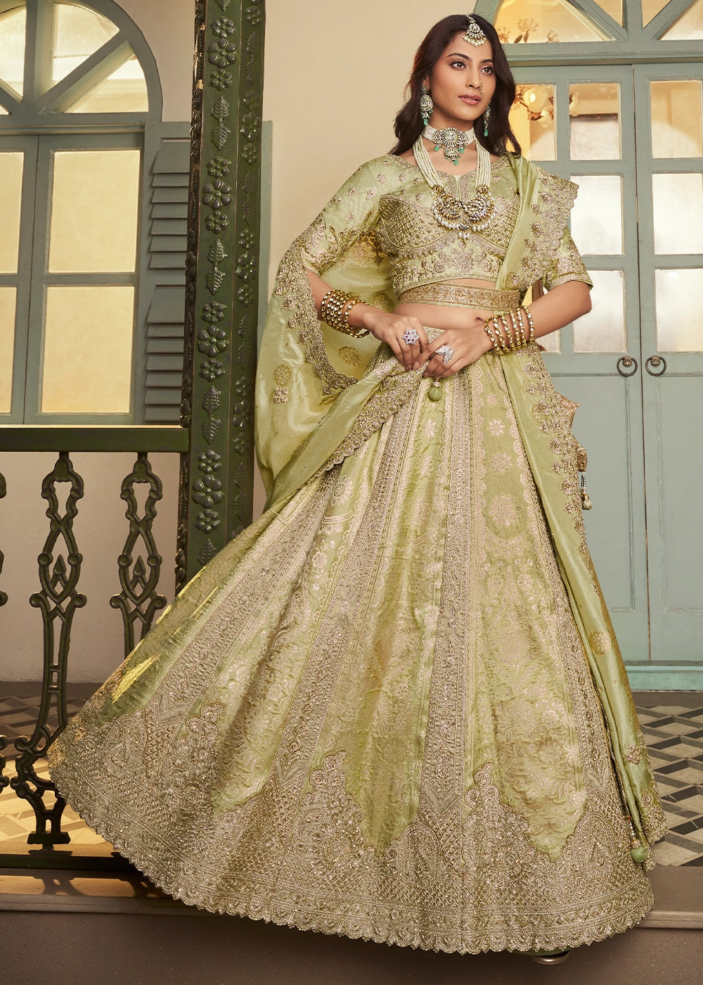 Tea Green Zari Woven Banarasi Silk Lehenga Choli with Traditional Motifs