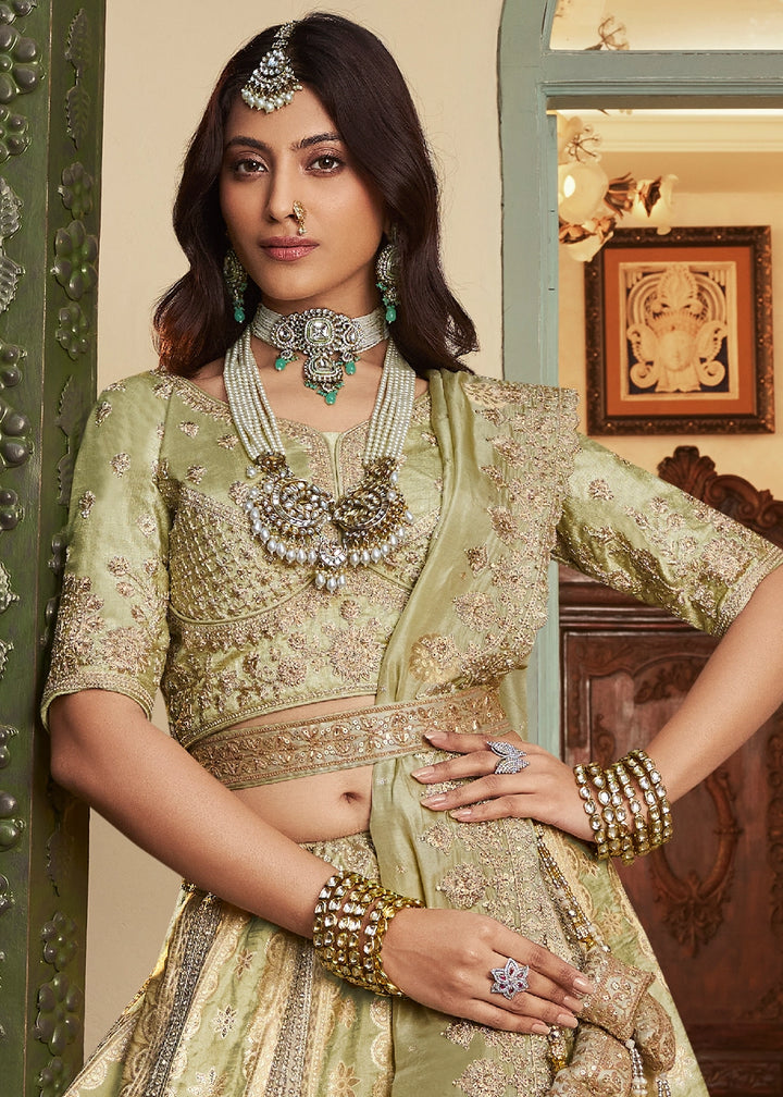 Tea Green Zari Woven Banarasi Silk Lehenga Choli with Traditional Motifs