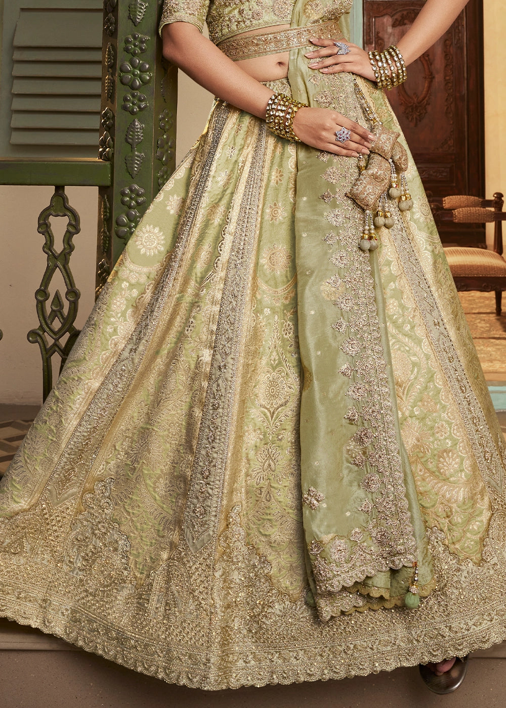 Tea Green Zari Woven Banarasi Silk Lehenga Choli with Traditional Motifs