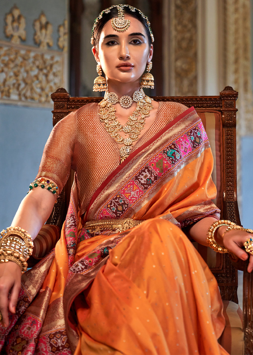 Apricot Orange Banarasi Silk Saree with Rich Patola Design and Zari Highlights