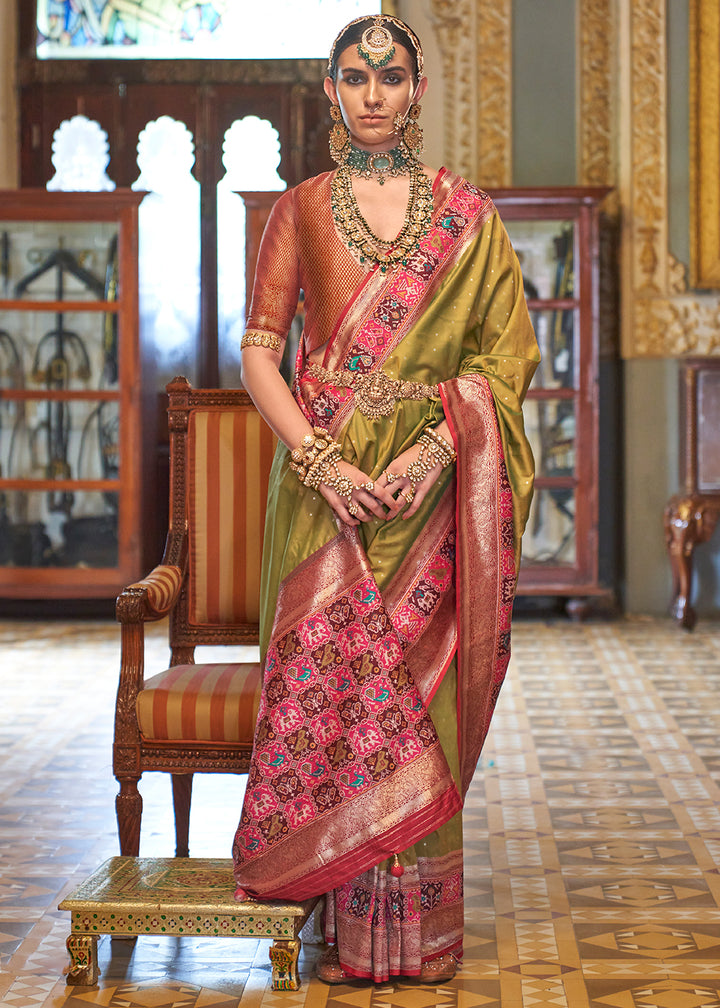 Pear Green Banarasi Silk Saree with Rich Patola Design and Zari Highlights