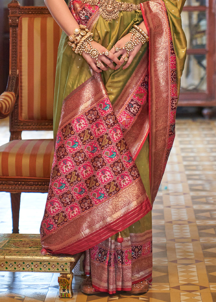 Pear Green Banarasi Silk Saree with Rich Patola Design and Zari Highlights