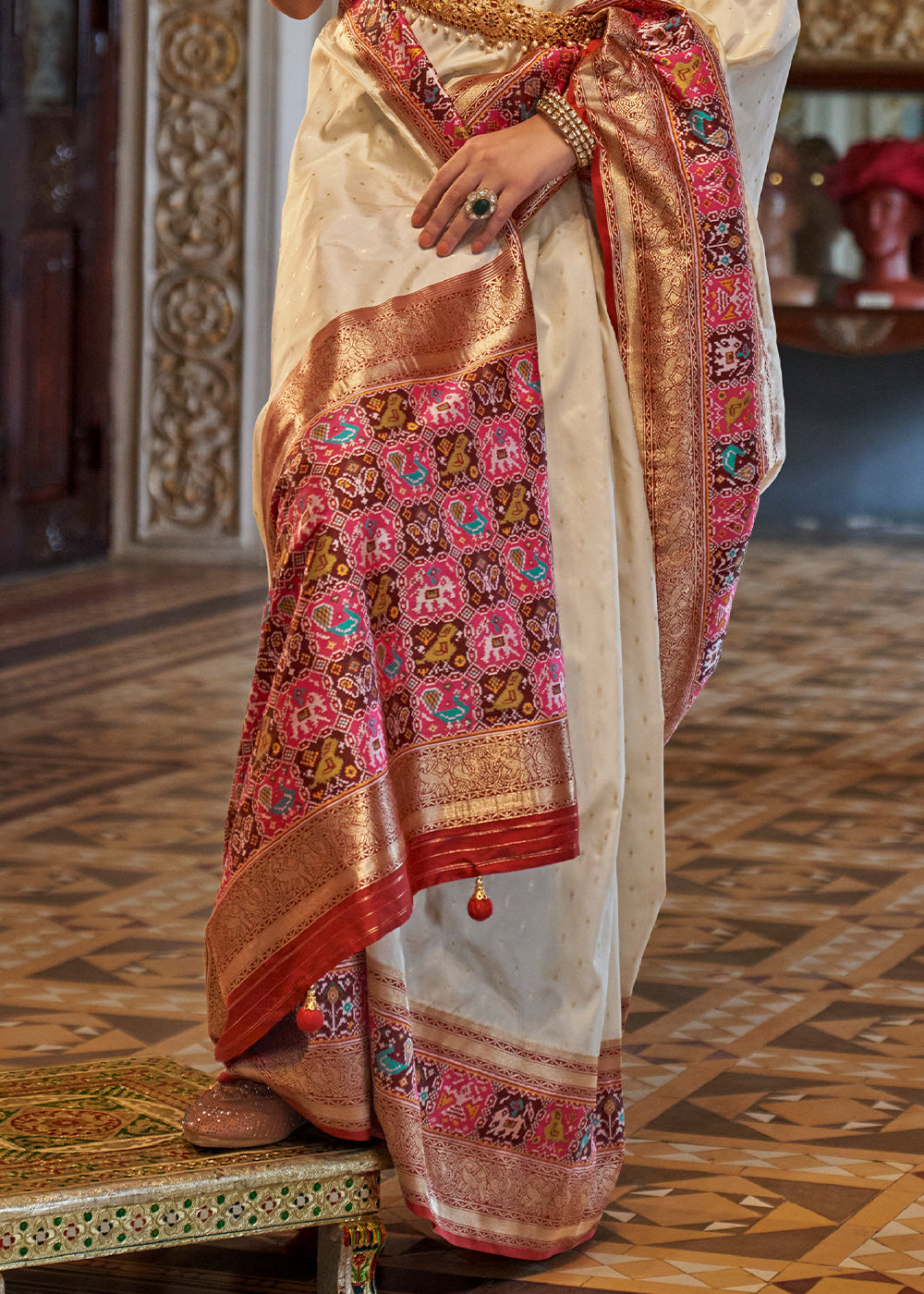 Pearl White Banarasi Silk Saree with Rich Patola Design and Zari Highlights