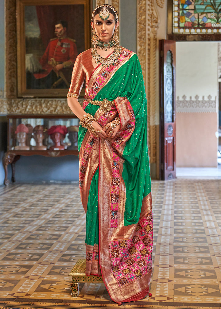 Jungle Green Banarasi Silk Saree with Rich Patola Design and Zari Highlights