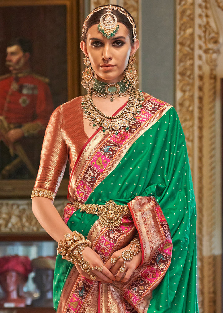 Jungle Green Banarasi Silk Saree with Rich Patola Design and Zari Highlights