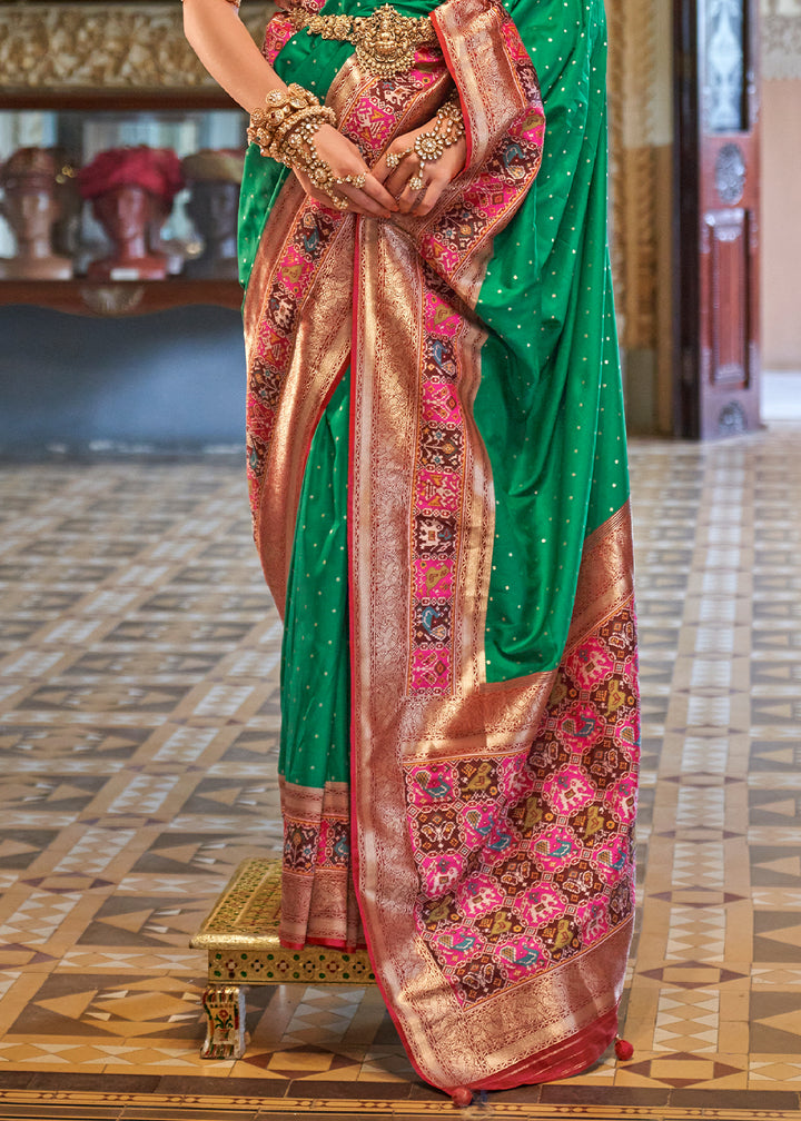 Jungle Green Banarasi Silk Saree with Rich Patola Design and Zari Highlights