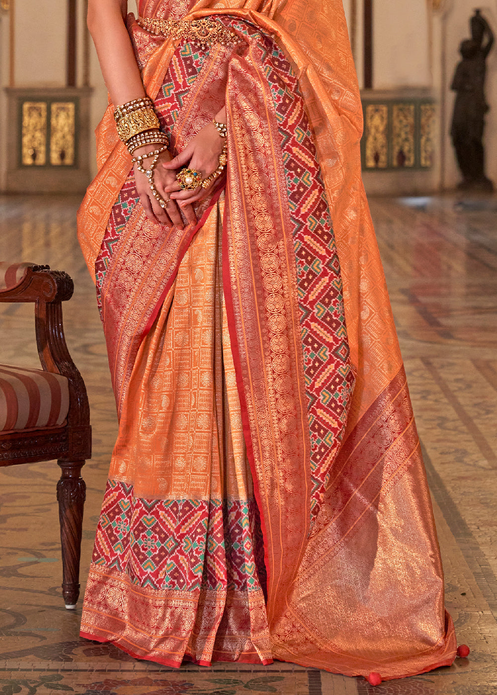 Peach Orange Banarasi Silk Saree with Rich Patola Design and Zari Highlights