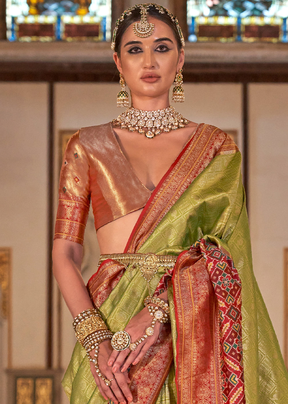 Light Olive Green Banarasi Silk Saree with Rich Patola Design and Zari Highlights