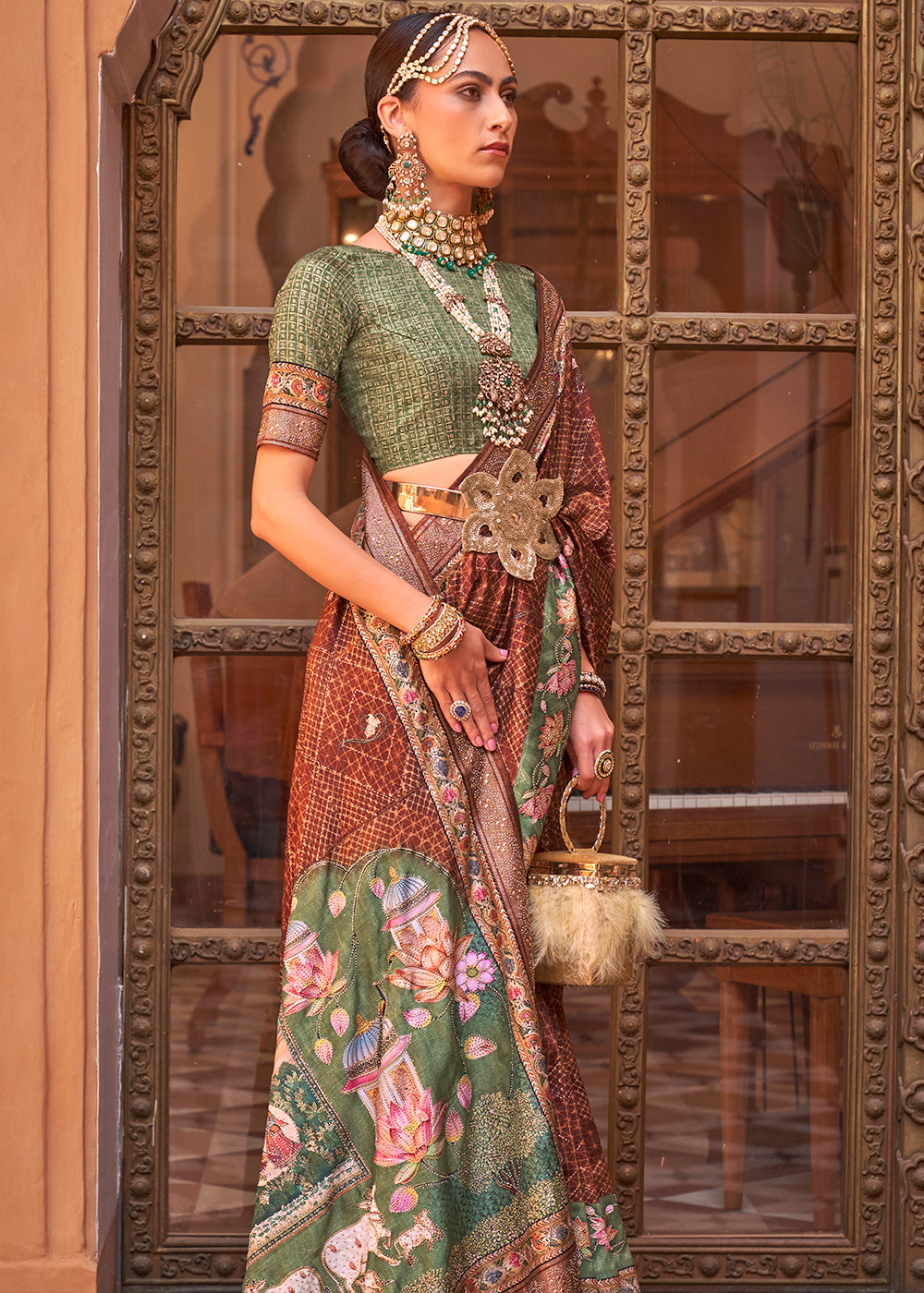 Brown & Green Silk Saree with Swarovski Embellishments and Unique Figure Motifs