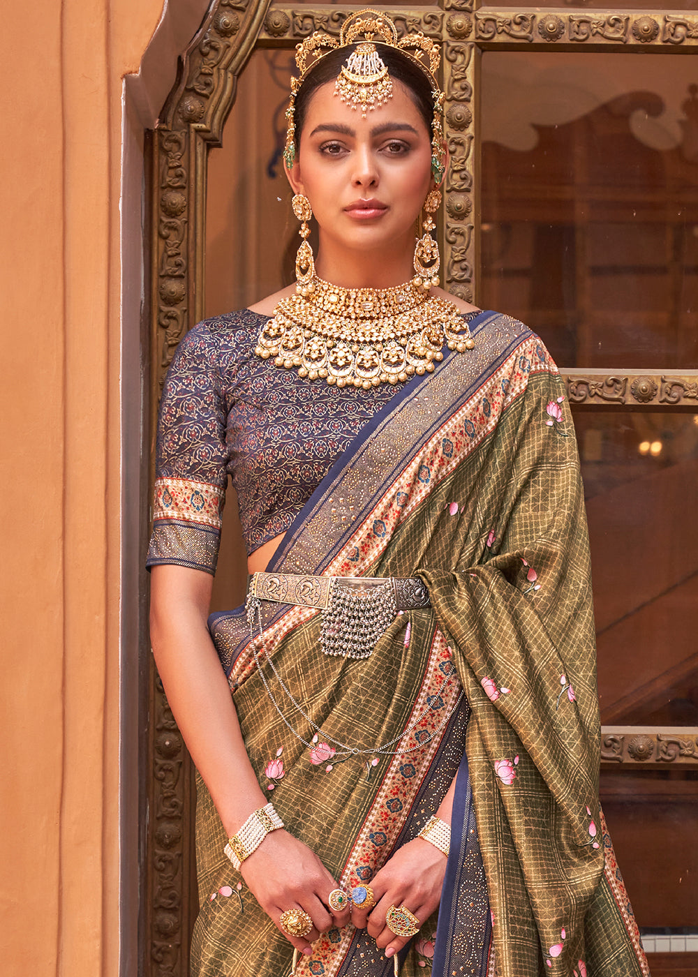 Light Olive Green Silk Saree with Swarovski Embellishments and Unique Figure Motifs