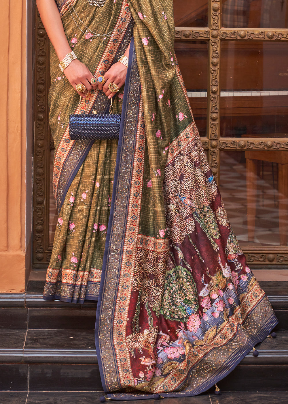 Light Olive Green Silk Saree with Swarovski Embellishments and Unique Figure Motifs