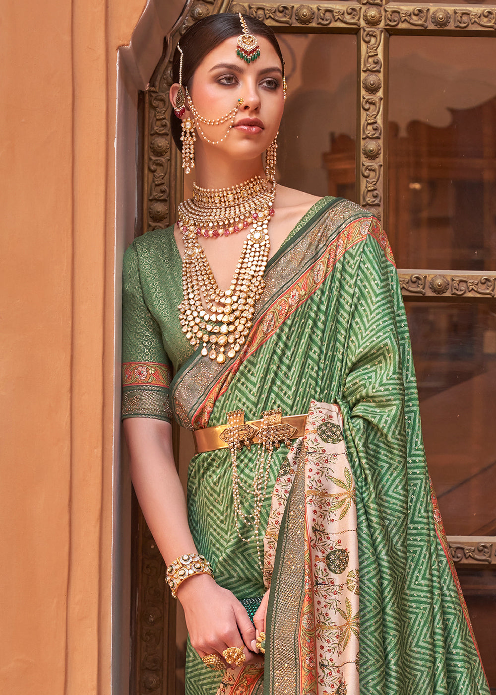 Pastel Green Silk Saree with Swarovski Embellishments and Unique Figure Motifs