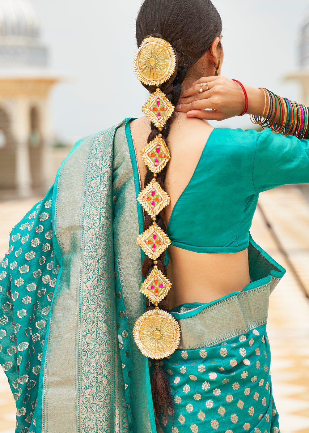 Emerald Green Georgette Silk Saree Featuring Woven Designer Patterns