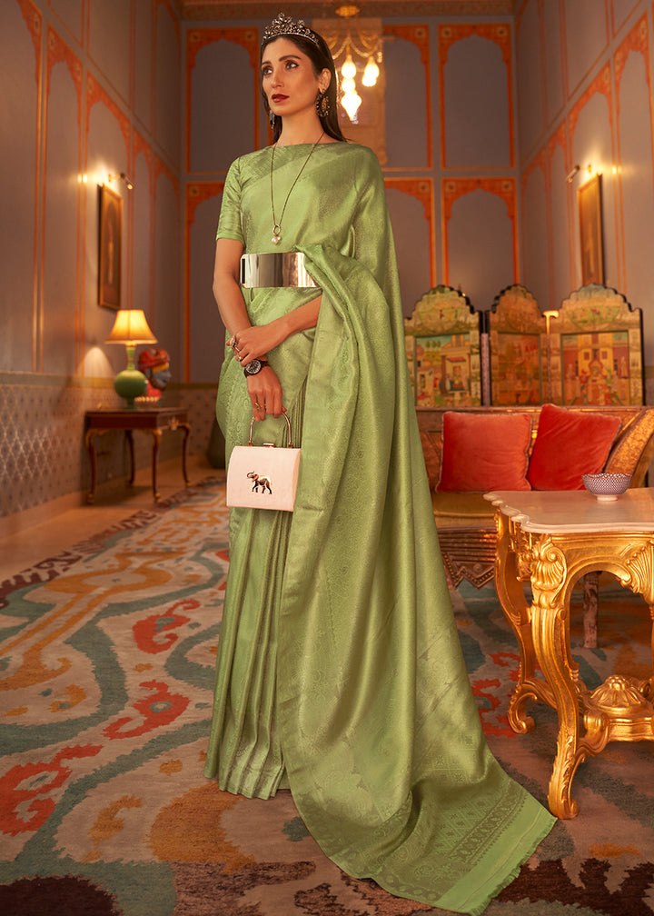 Pistachio Green Satin Silk Saree Featuring Zari Woven Patterns