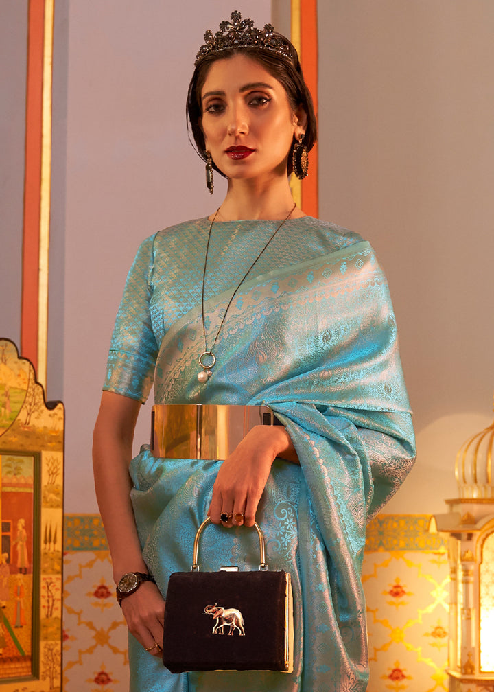 Aqua Blue Satin Silk Saree Featuring Zari Woven Patterns