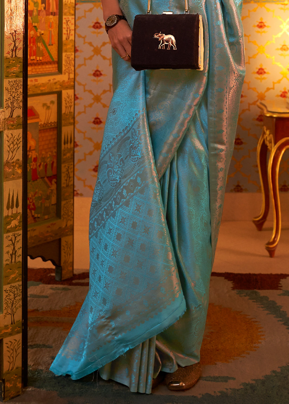 Aqua Blue Satin Silk Saree Featuring Zari Woven Patterns