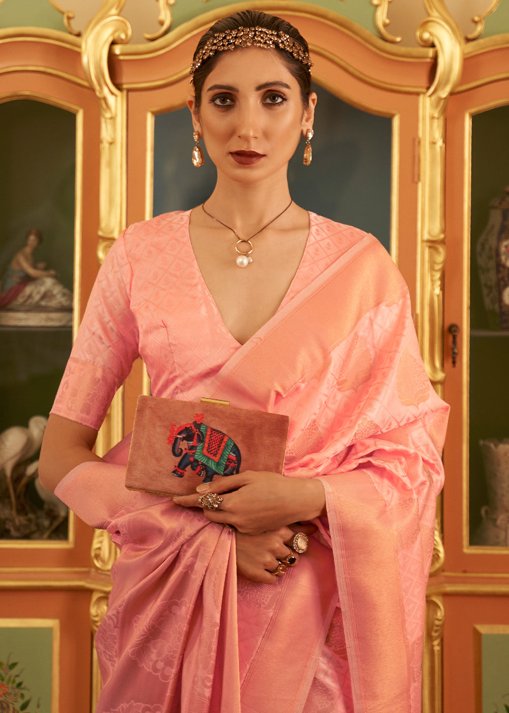 Salmon Pink Kanjivaram Silk Saree Crafted with Copper Zari Work