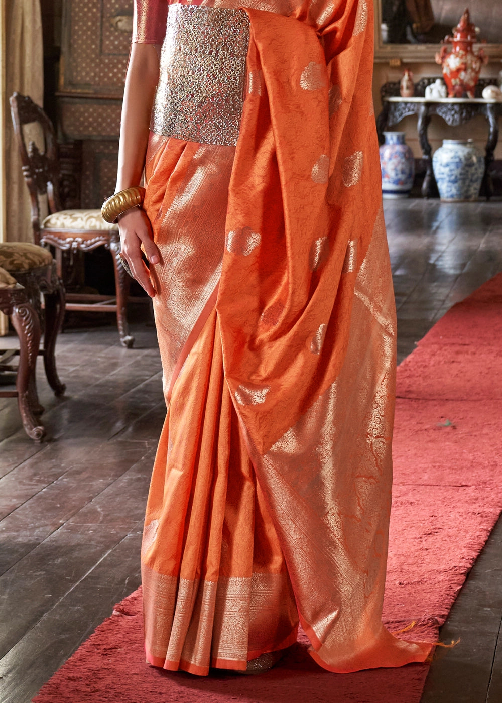 Lava Orange Silk Saree with Subtle Two-Tone Weave and Brocade Blouse