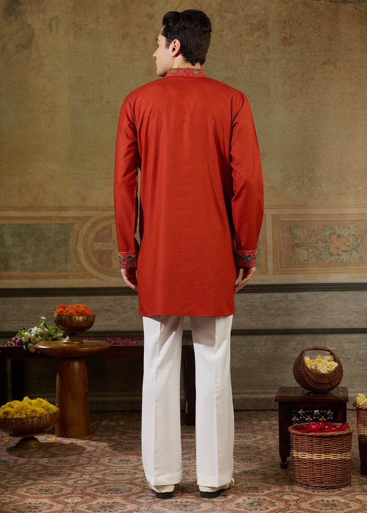 Reddish Orange Rayon Kurta Set with Vivid Resham Detailing