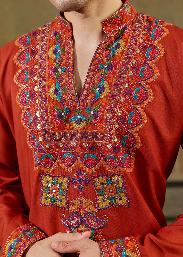 Reddish Orange Rayon Kurta Set with Vivid Resham Detailing