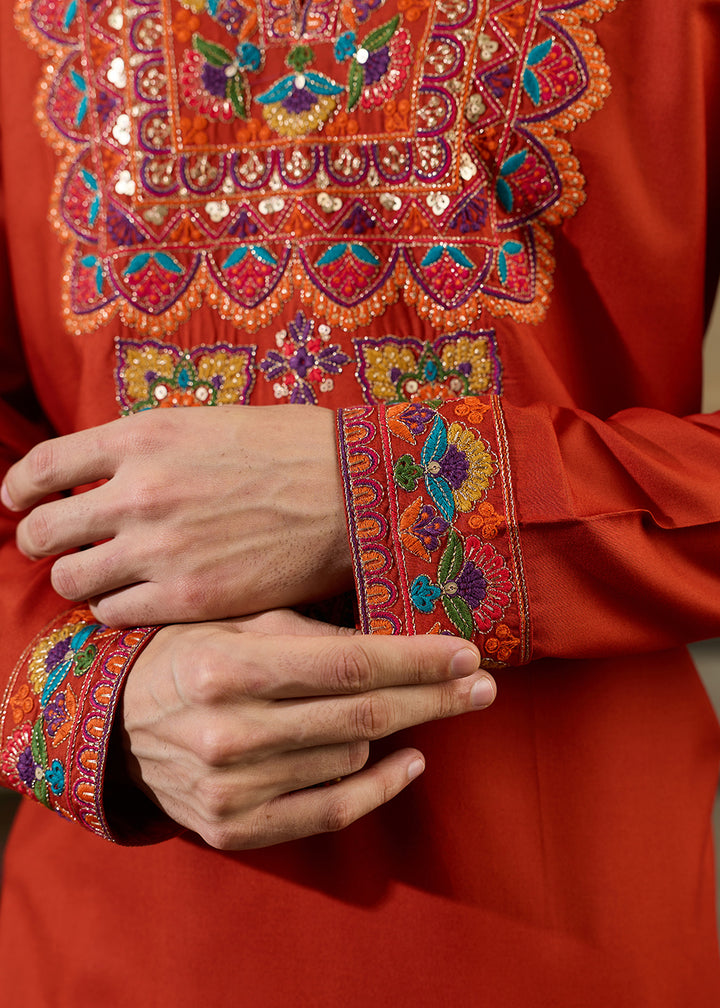 Reddish Orange Rayon Kurta Set with Vivid Resham Detailing