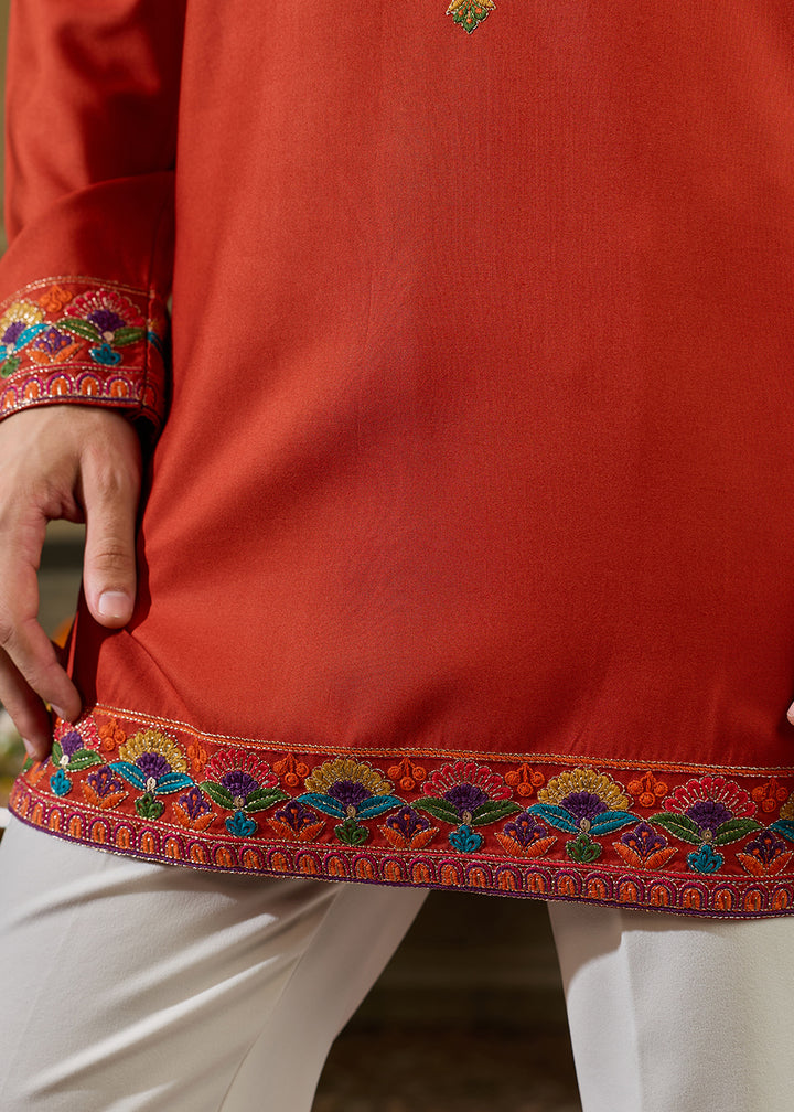 Reddish Orange Rayon Kurta Set with Vivid Resham Detailing