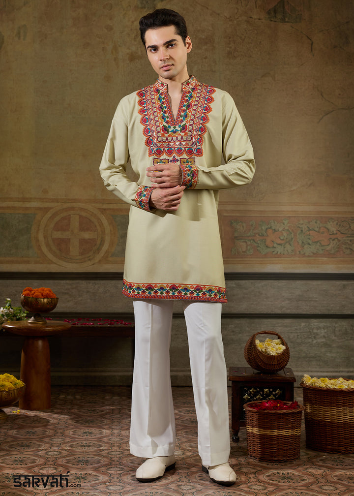 Tea Green Rayon Kurta Set with Vivid Resham Detailing