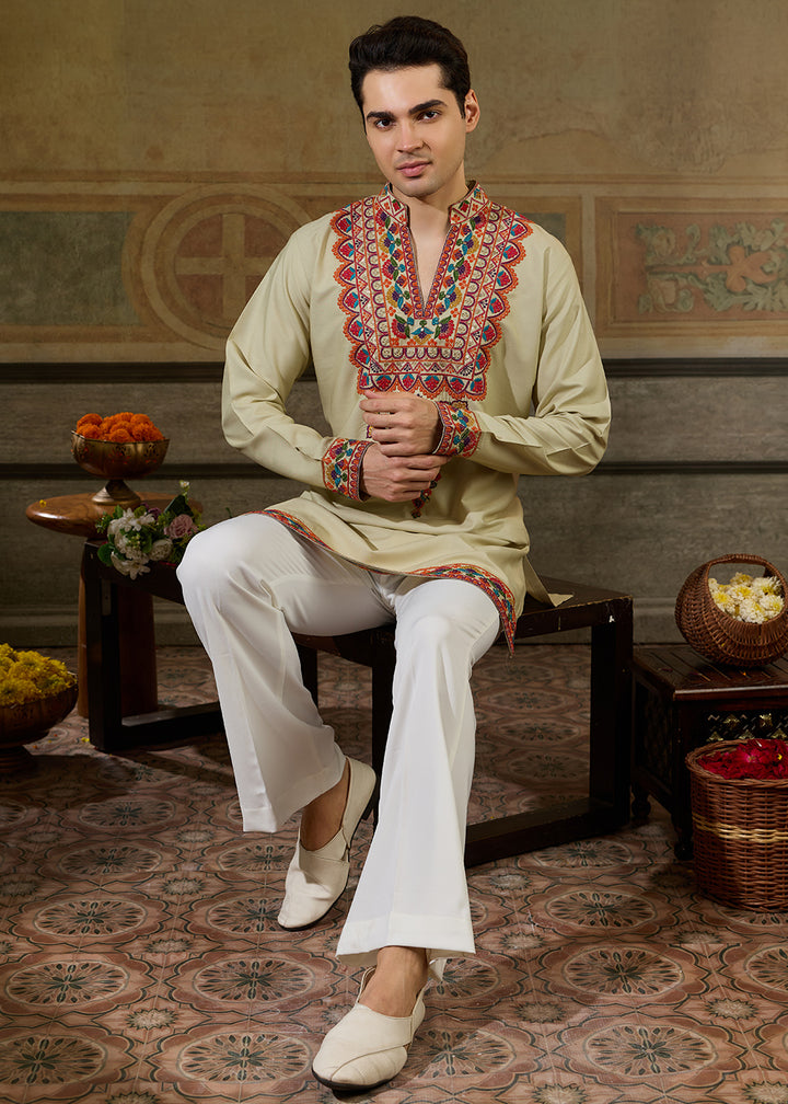 Tea Green Rayon Kurta Set with Vivid Resham Detailing