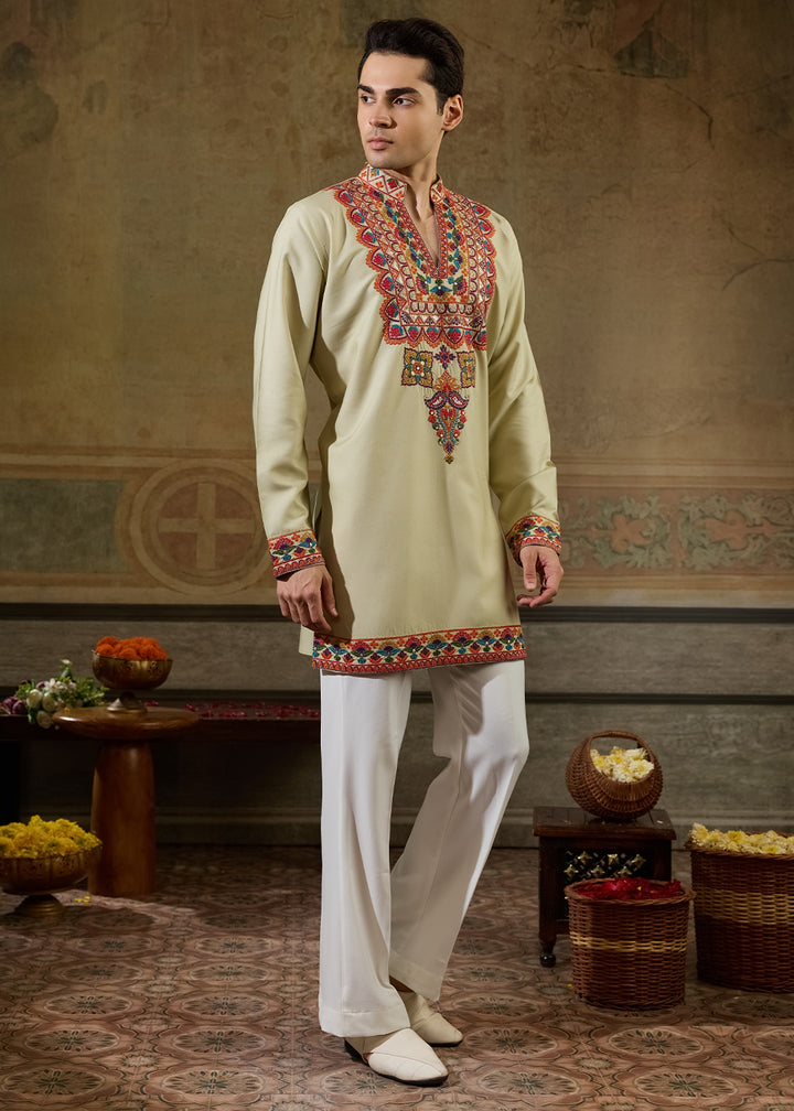 Tea Green Rayon Kurta Set with Vivid Resham Detailing