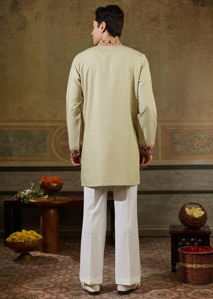 Tea Green Rayon Kurta Set with Vivid Resham Detailing