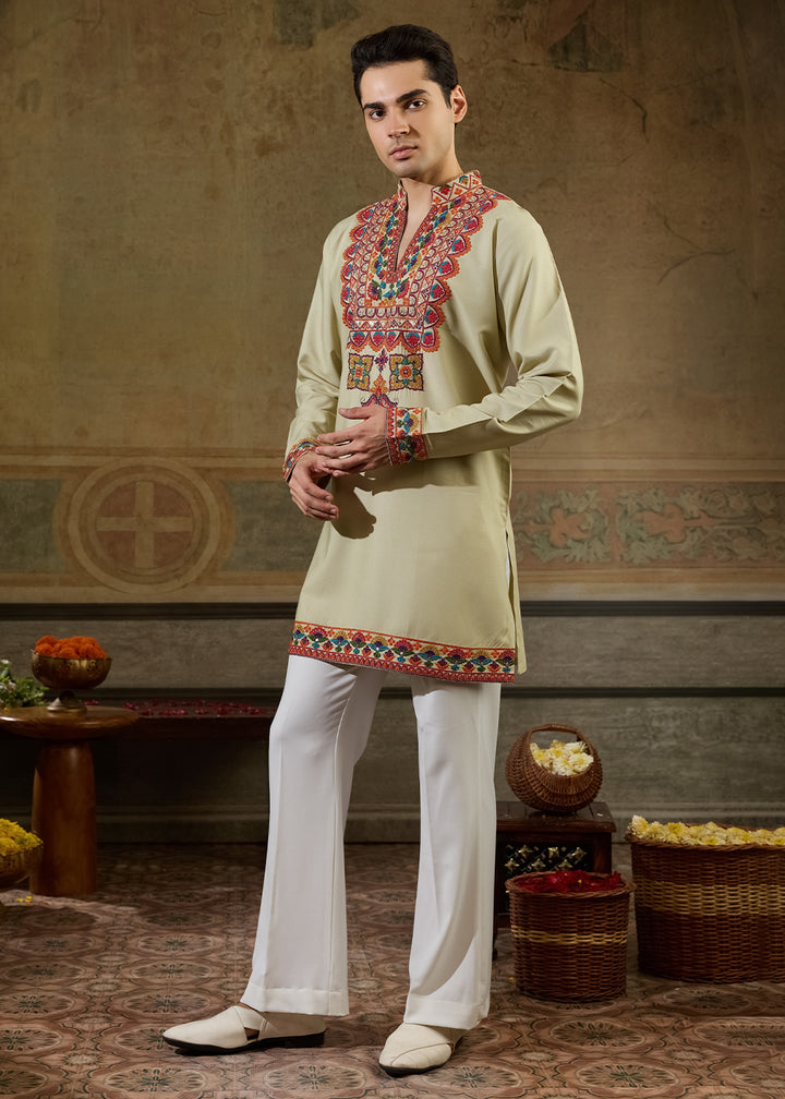 Tea Green Rayon Kurta Set with Vivid Resham Detailing