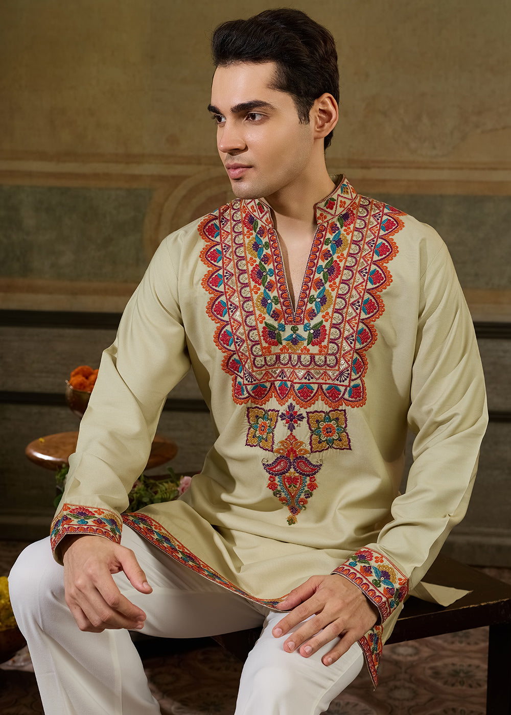 Tea Green Rayon Kurta Set with Vivid Resham Detailing