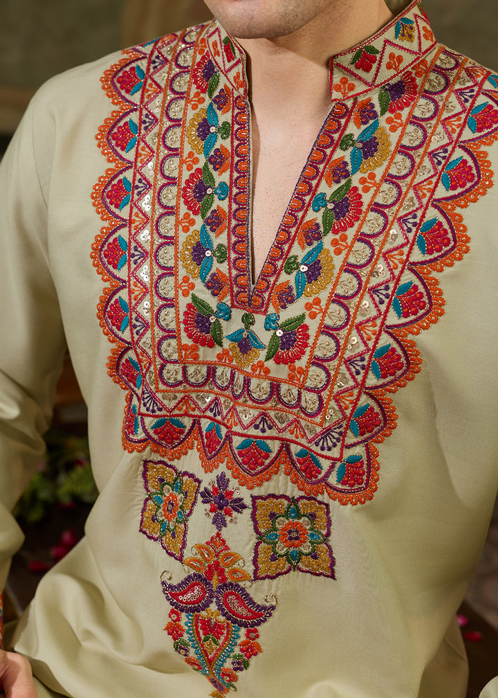 Tea Green Rayon Kurta Set with Vivid Resham Detailing