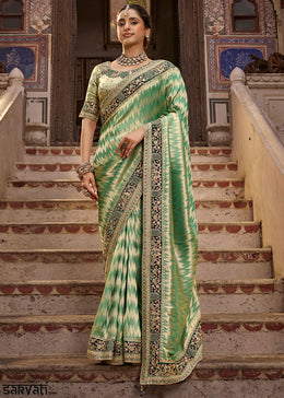 Pastel Green Viscose Kanchipuram Saree with Regal Weave Border