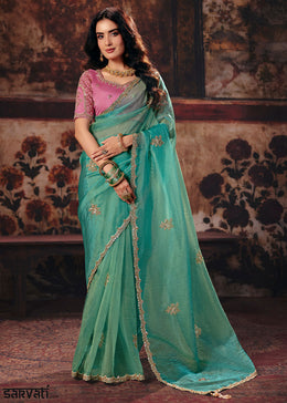 Turquoise Blue Organza Saree with Threadwork & Sequin Embellishments