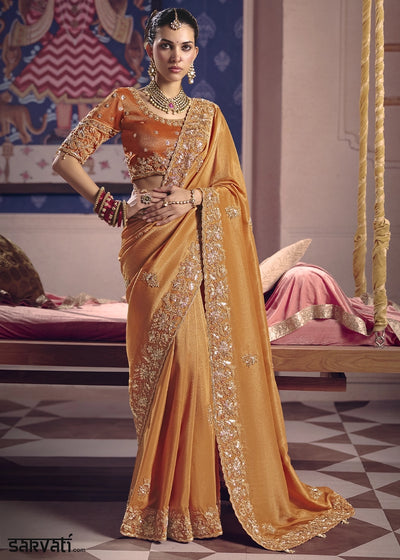 Glossy Orange Viscose Tissue Saree with Intricate Zari & Bead Embroidery