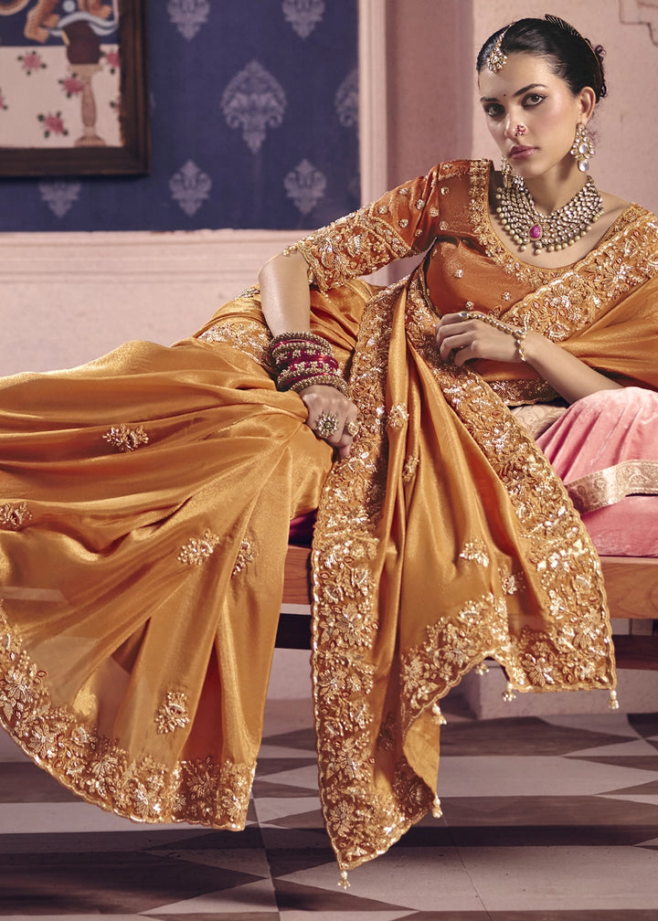 Glossy Orange Viscose Tissue Saree with Intricate Zari & Bead Embroidery