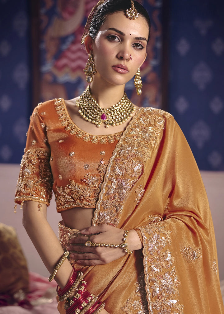 Glossy Orange Viscose Tissue Saree with Intricate Zari & Bead Embroidery