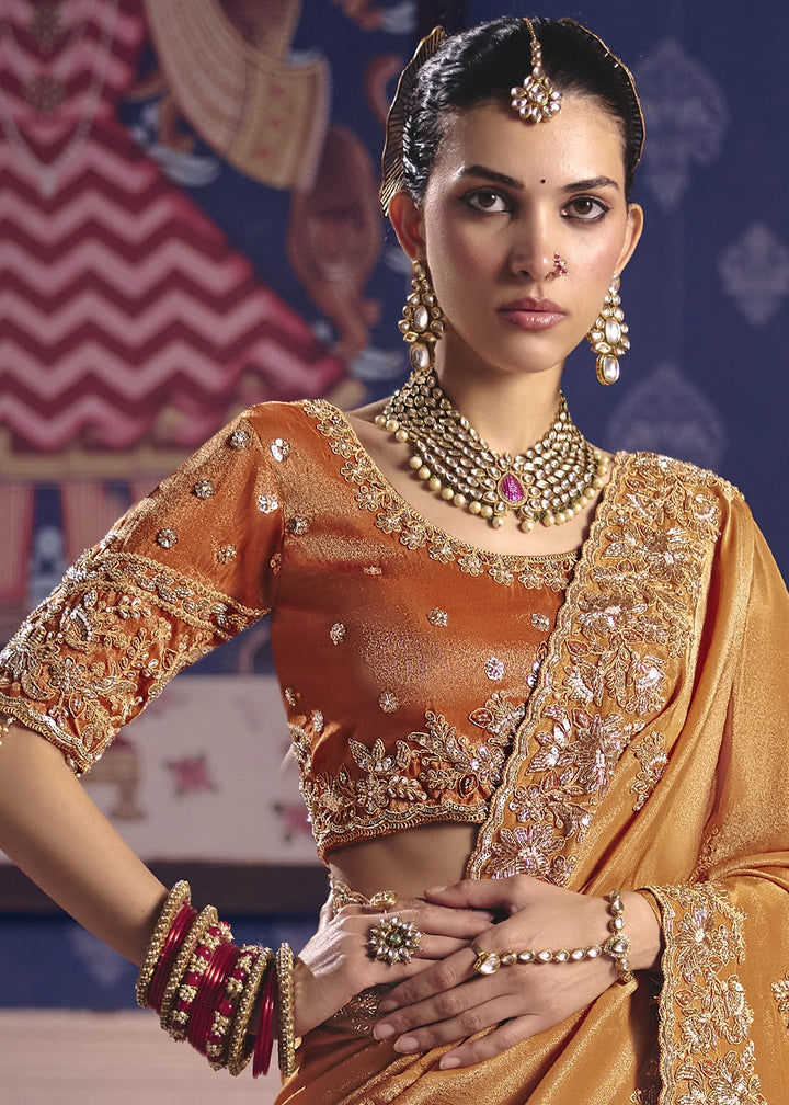 Glossy Orange Viscose Tissue Saree with Intricate Zari & Bead Embroidery
