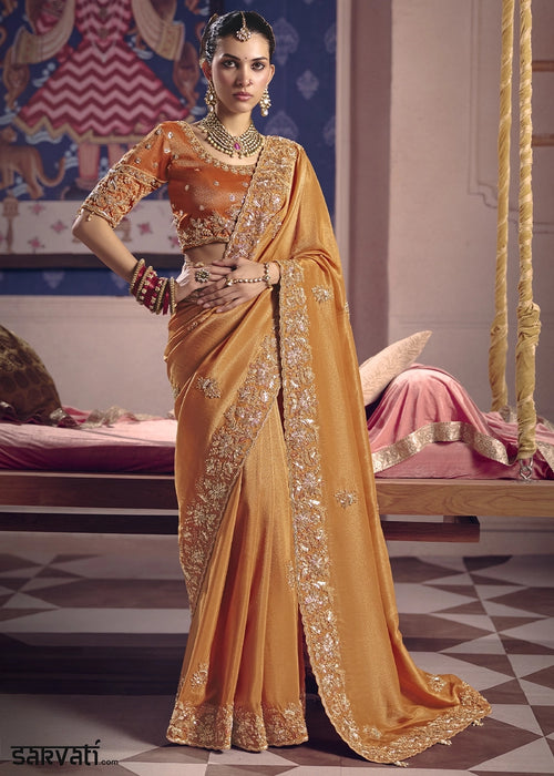 Glossy Orange Viscose Tissue Saree with Intricate Zari & Bead Embroidery