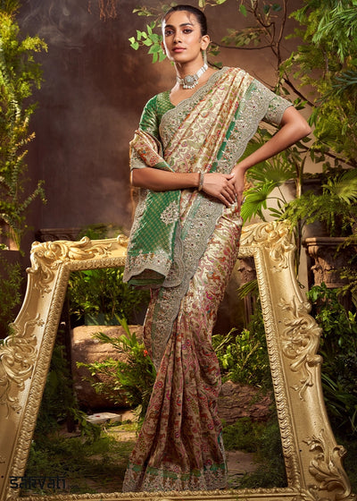 Cream & Green Viscose Banarasi Silk Saree with Intricate Floral and Zari Work