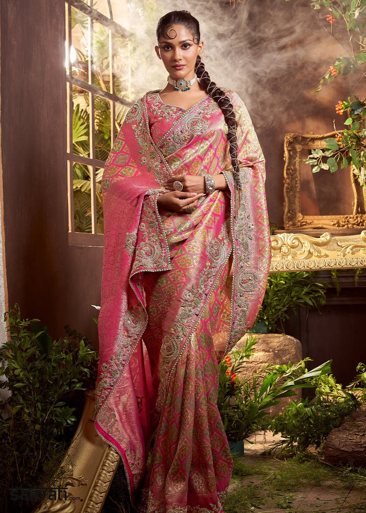 Pastel Pink Banarasi Silk Saree featuring Heavy Embroidery and Zari Detailing