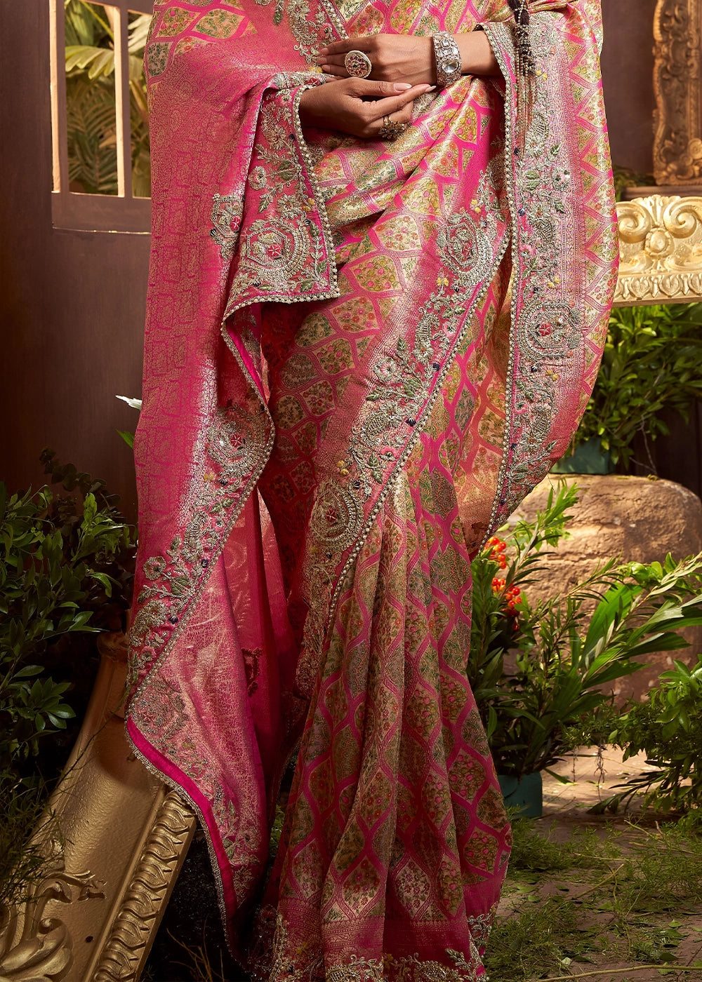 Pastel Pink Banarasi Silk Saree featuring Heavy Embroidery and Zari Detailing