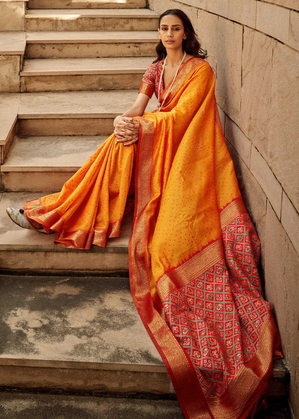 Pumpkin Orange Patola Silk Saree with Intricate Handloom Work