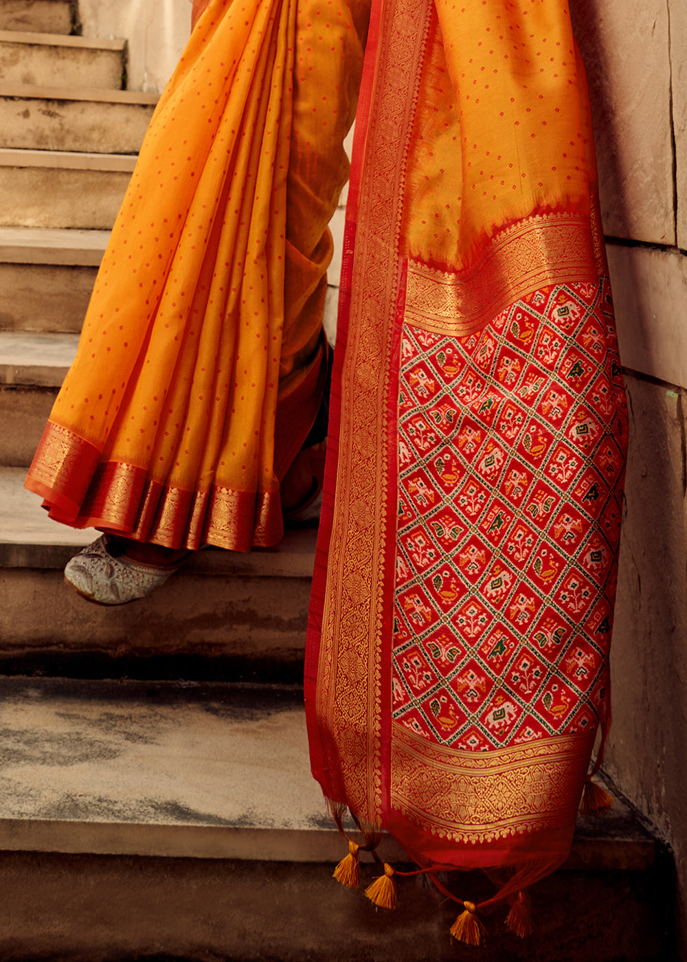 Pumpkin Orange Patola Silk Saree with Intricate Handloom Work