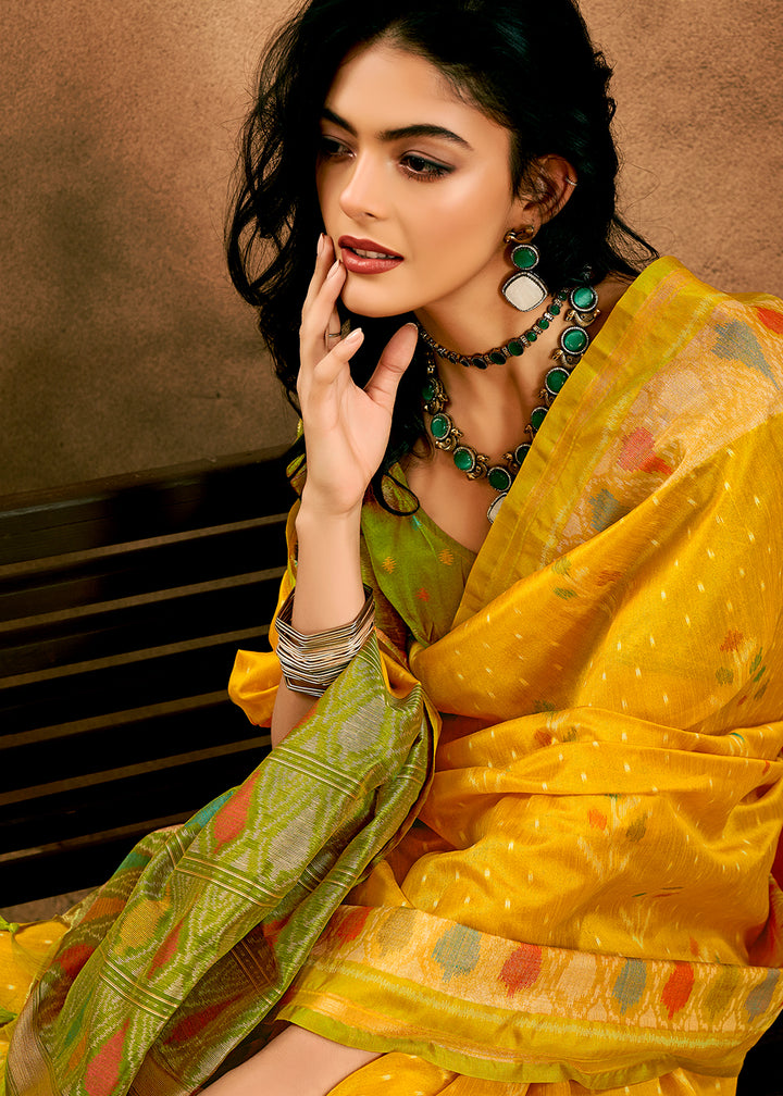 Saffron Yellow Patola Silk Saree with Intricate Design