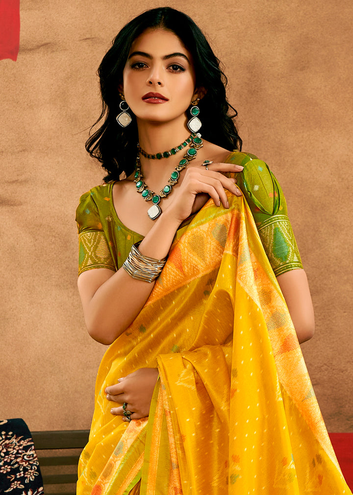 Saffron Yellow Patola Silk Saree with Intricate Design